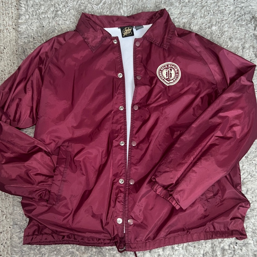 Maroon windbreaker by Benny Gold; Size: Men’s Large